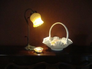 My mother collected both milk glass and baskets, and I treasure this milk-glass basket. It served as a conversation piece as well as a way to deliver sweets to residents at Oak Tree Villas. I shot this photo in the activity room at Oak Tree Villas. 